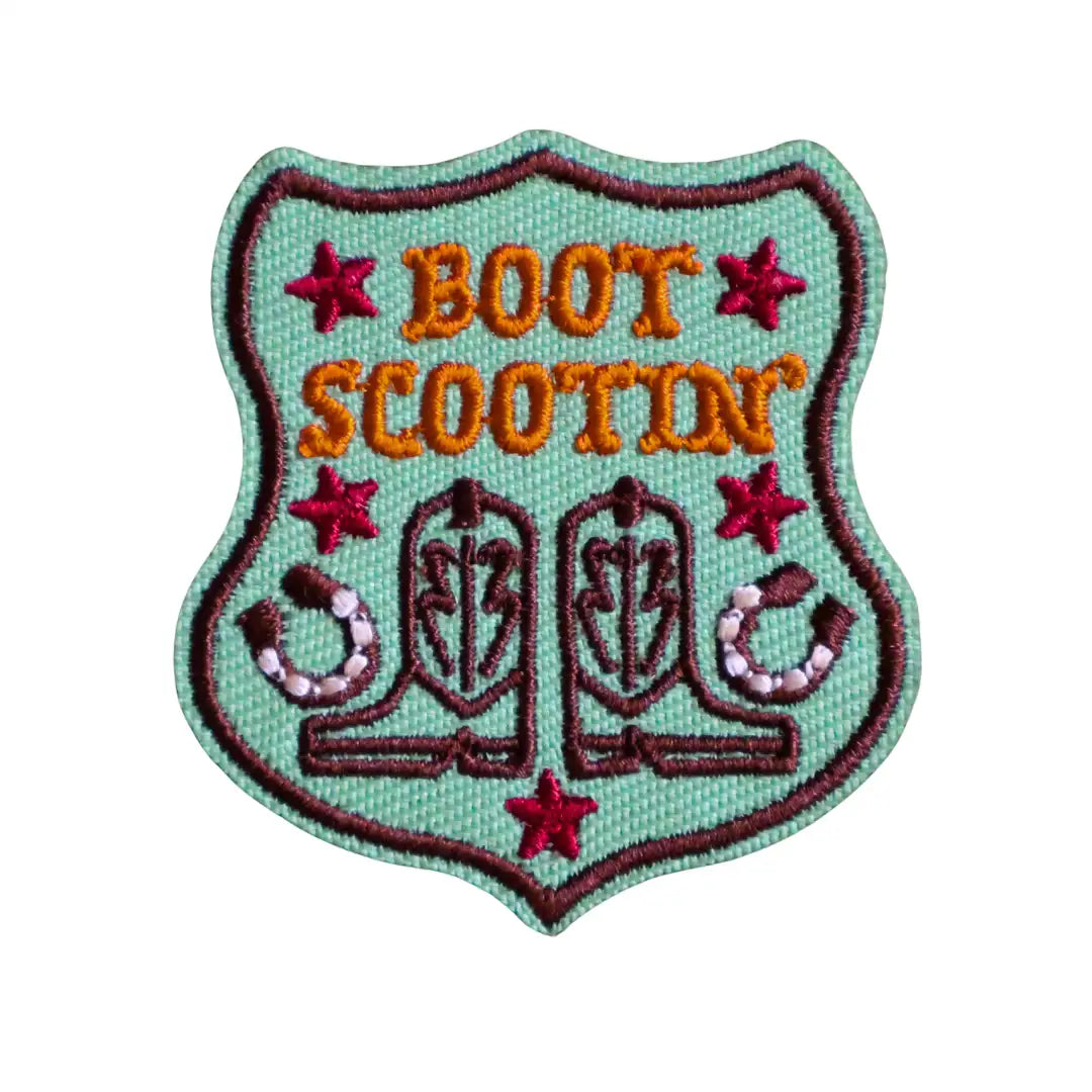 Embroidered Iron-on patch with 'Boot Scootin' text and cowboy boots and horseshoe design on a light green background